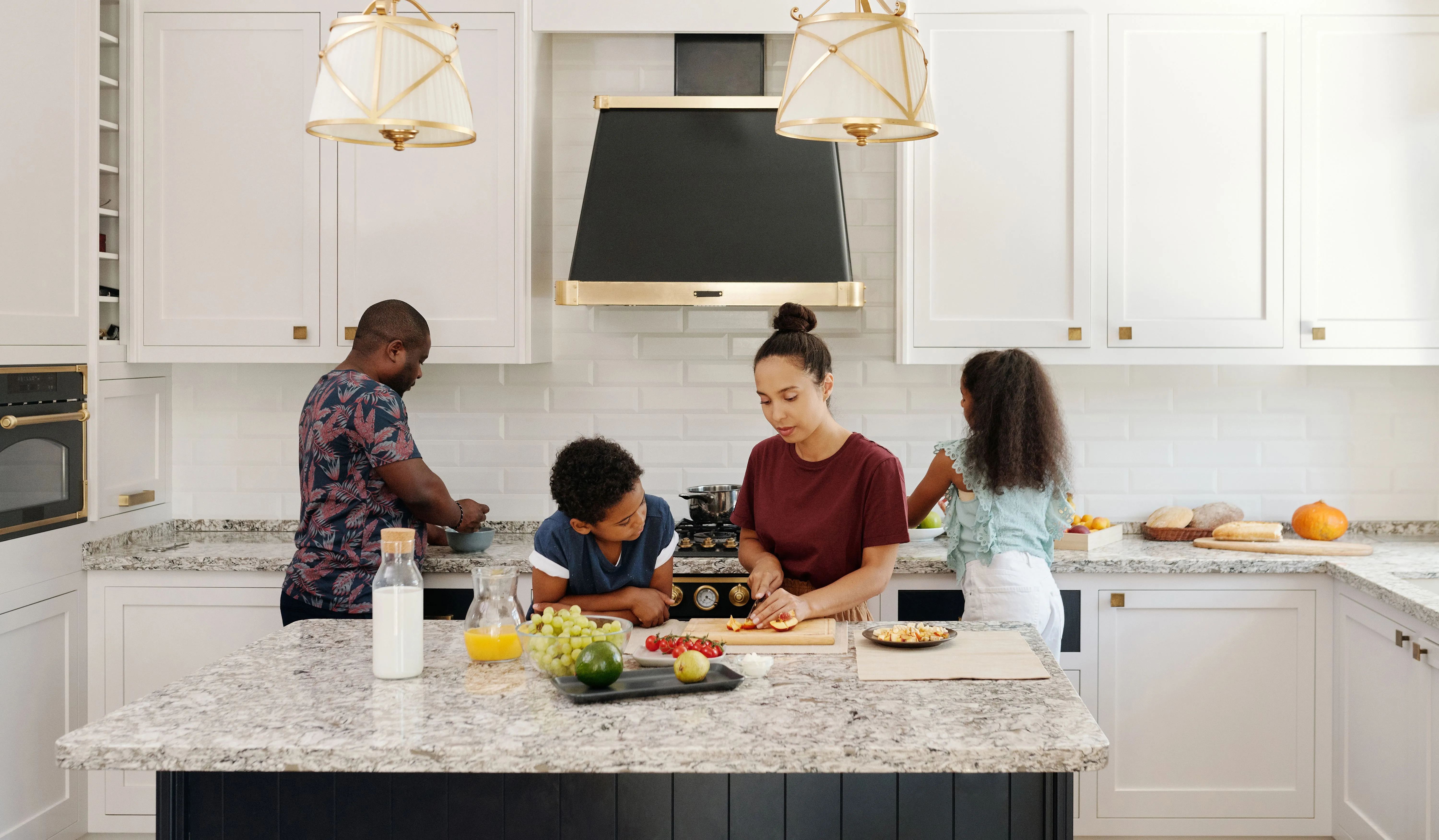 Family cooking together in a modular kitchen